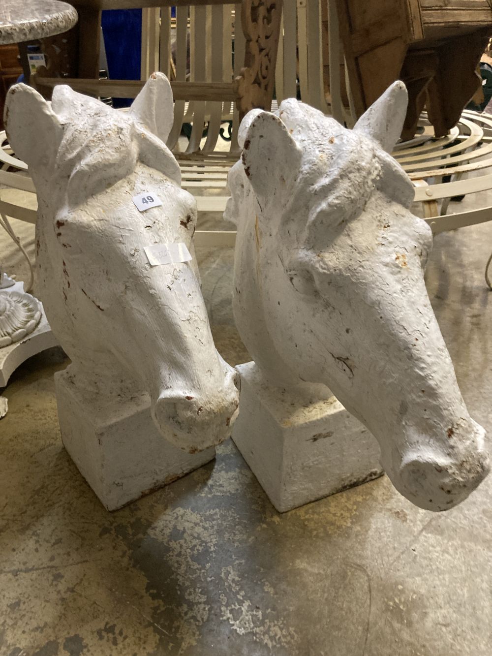 A pair of Victorian painted cast iron horse head garden ornaments, height 62cm